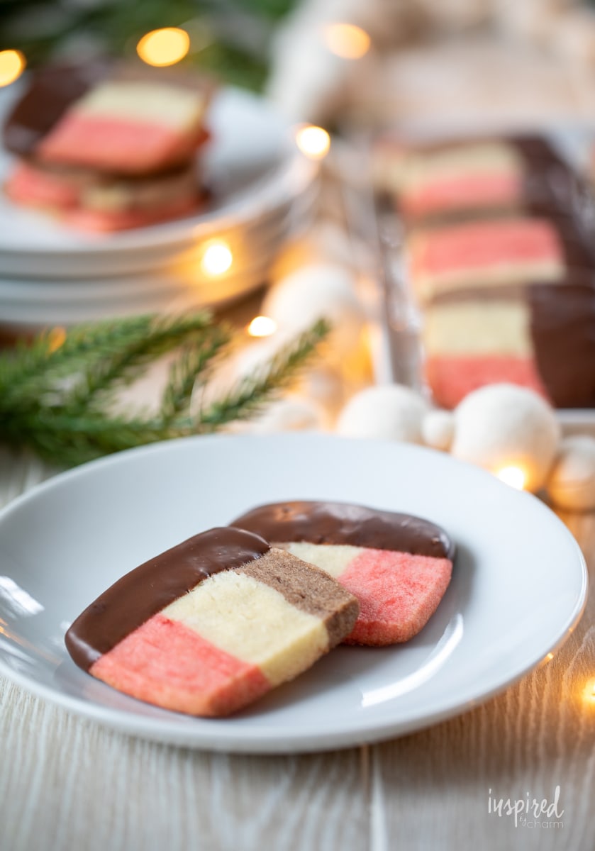 two Neapolitan Cookies on a plate.