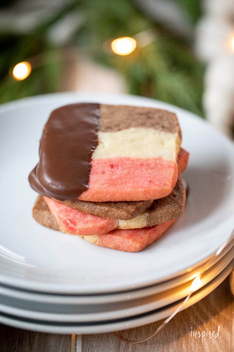 stack of three Neapolitan Cookies on a plate.