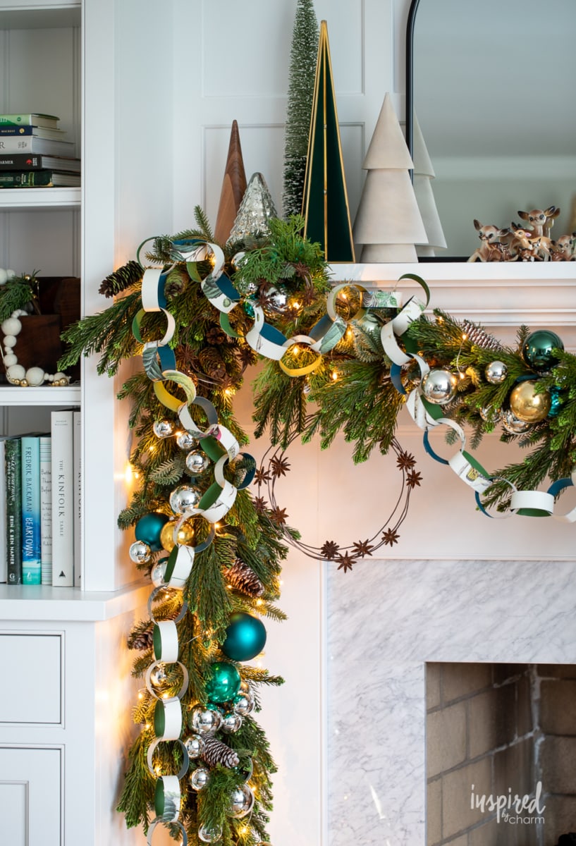 close up of mantel garland with diy paper chain and anise star wreath.