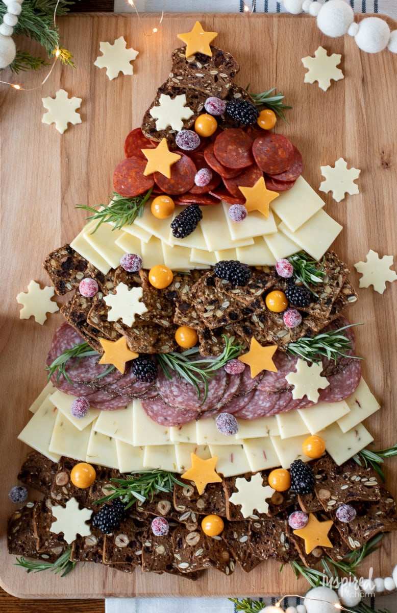 Christmas Cheese Board  shared like a tree on a table. 