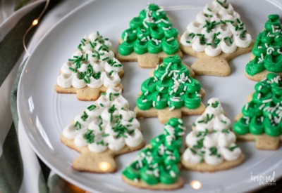 tree shaped Frosted Almond Sugar Cookies on a plate,