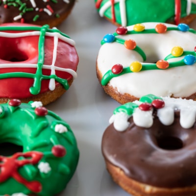 close up for christmas donuts on a platter.