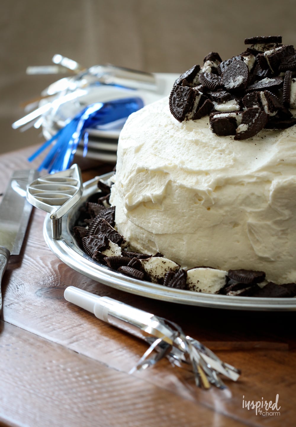 cookies and cream cake on a silver platter.