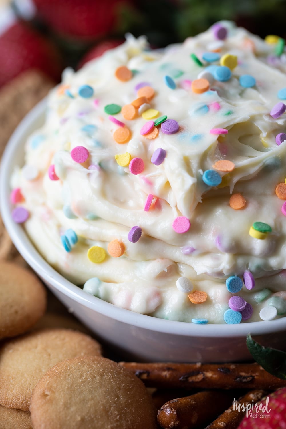 funfetti dessert dip in a bowl with sprinkles.