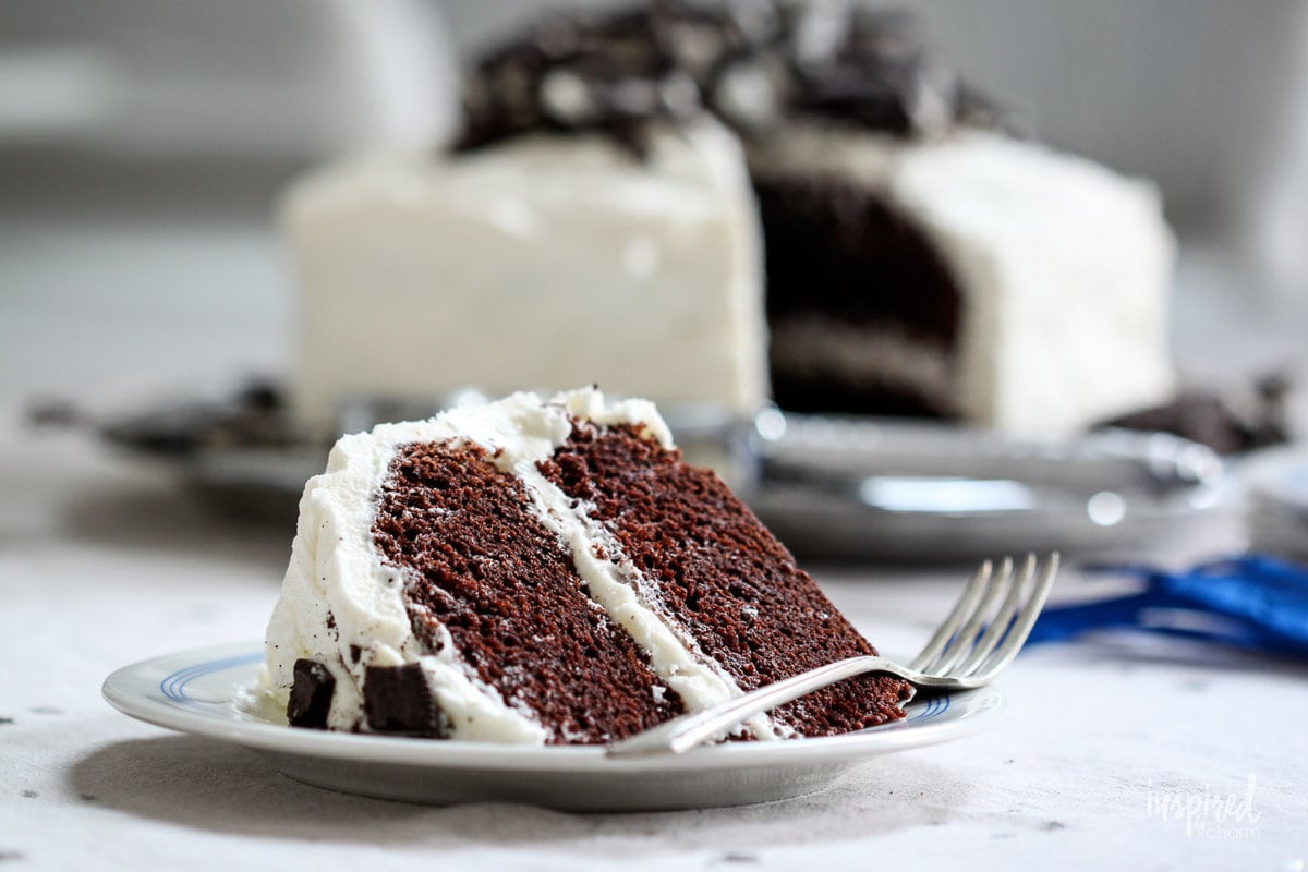 piece of cookies and cream cake on a plate.