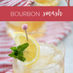 bourbon smash cocktail in rocks class with lemon wedge and mint garnish.