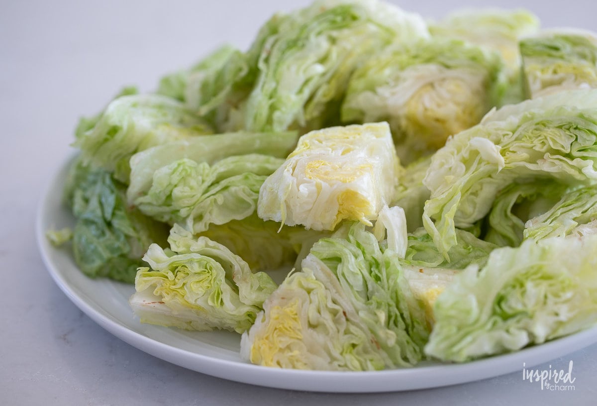 iceberg lettuce chunks on plate.