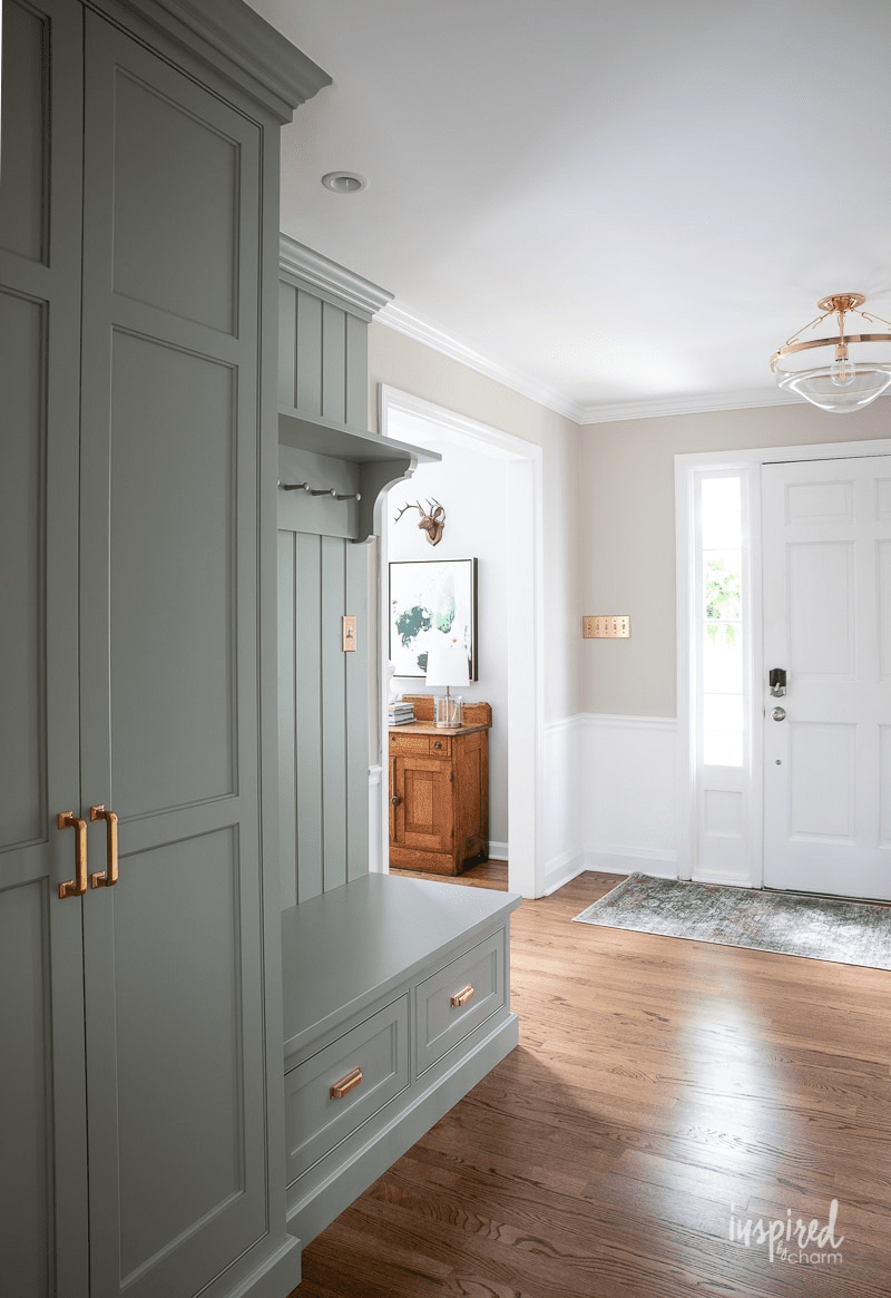 Entryway with Farrow and Ball Pigeon cabinetry, Farrow and Ball Shaded White No. 201 for the walls and Sherwin-Williams Extra White SW7006 for the trim