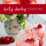 dirty shirley cocktail in glass garnished with cherries Pinterest image.