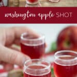 washington apple shots on a cutting board with hand holding one.