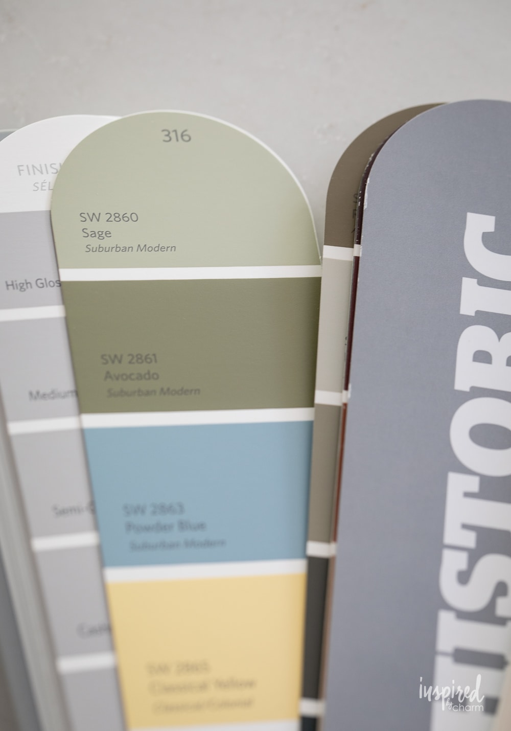 color card fan deck for paint colors with a close up on Sherwin-Williams sage.
