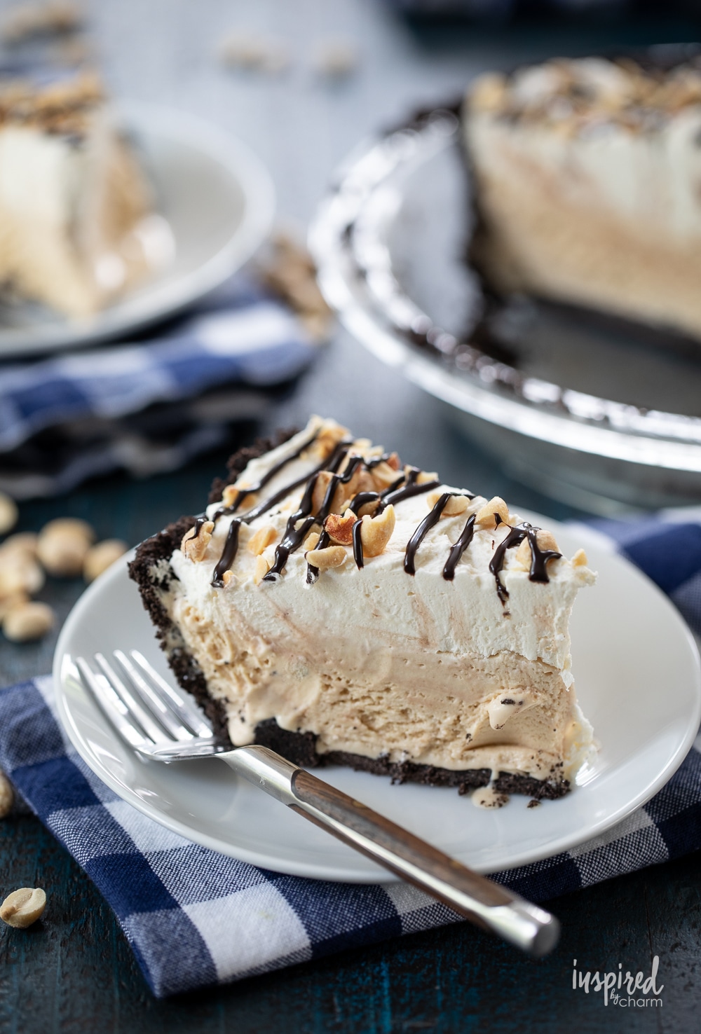 peanut butter ice cream pie on a plate with a fork.