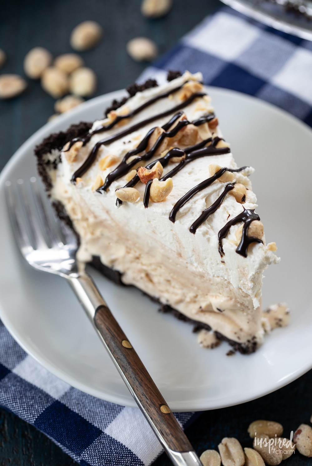 slice of peanut butter ice cream pie on a white plate.