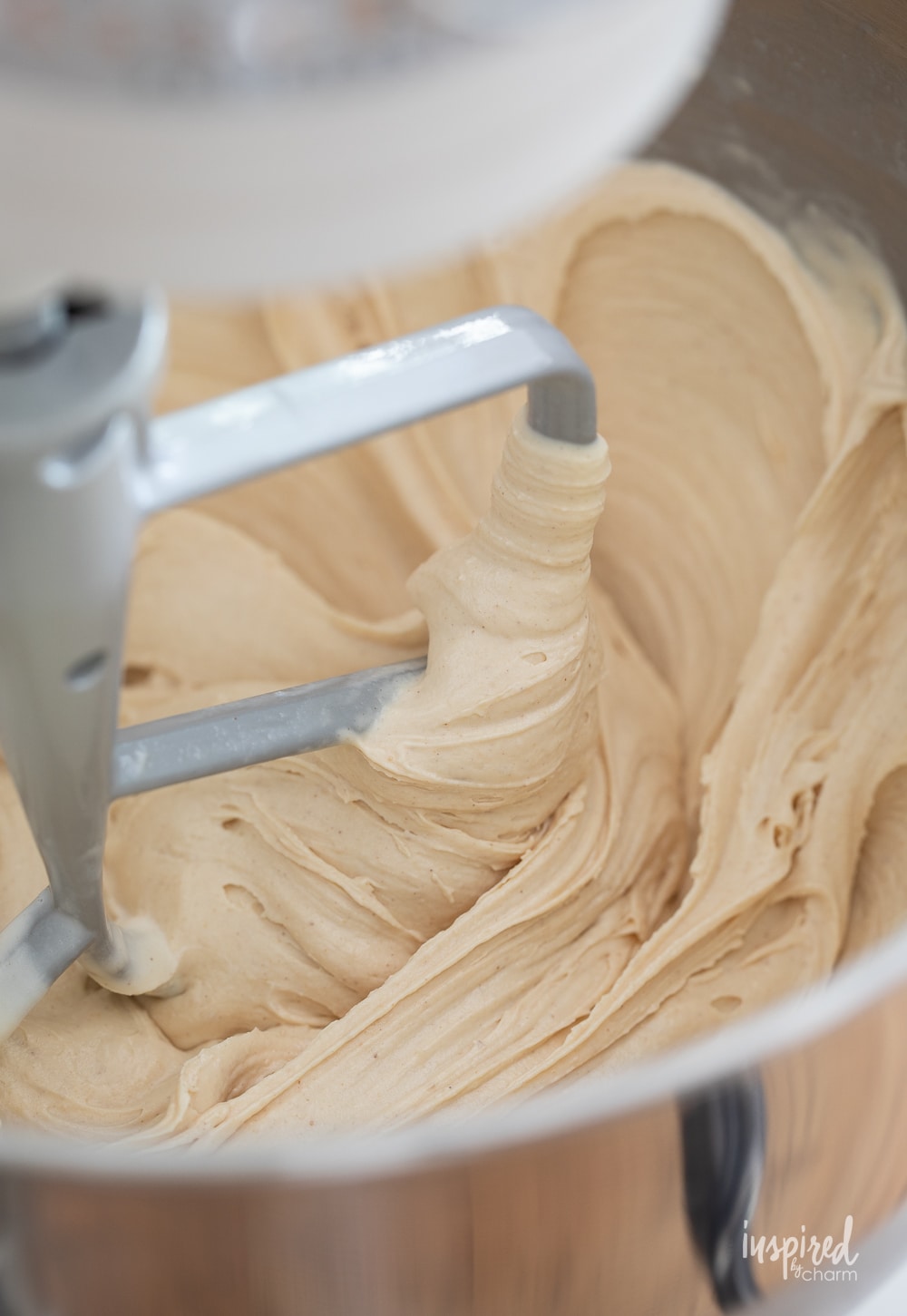 peanut butter ice cream in a stand mixer with paddle attachment.