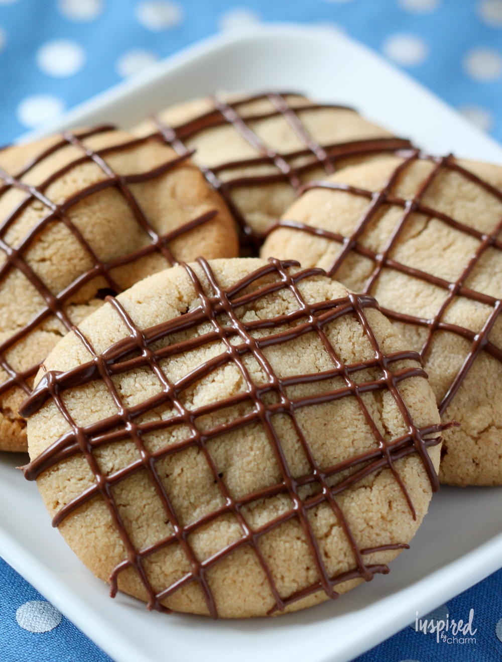 close up of stuffed peanut butter cup cookies.