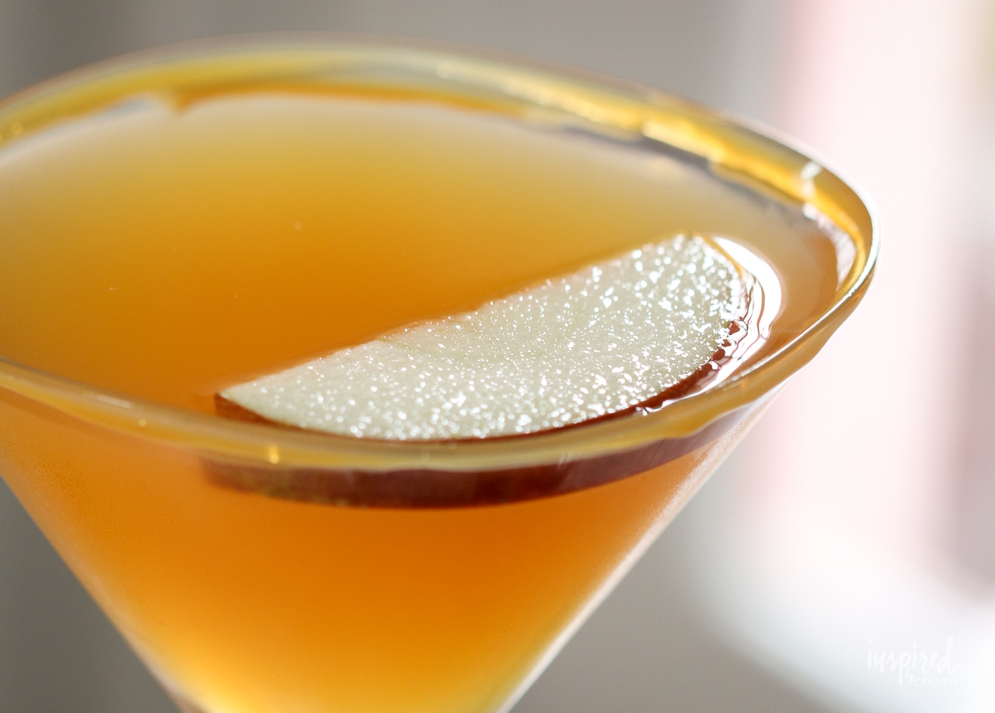 close up of a caramel apple martini.