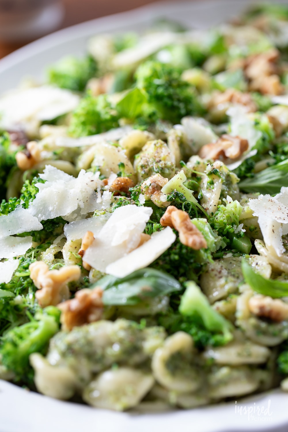 detailed up close photo of broccoli pesto pasta served for dinner. 