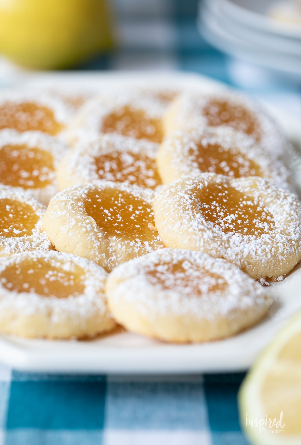 a platter filled with lemon curd cookies.