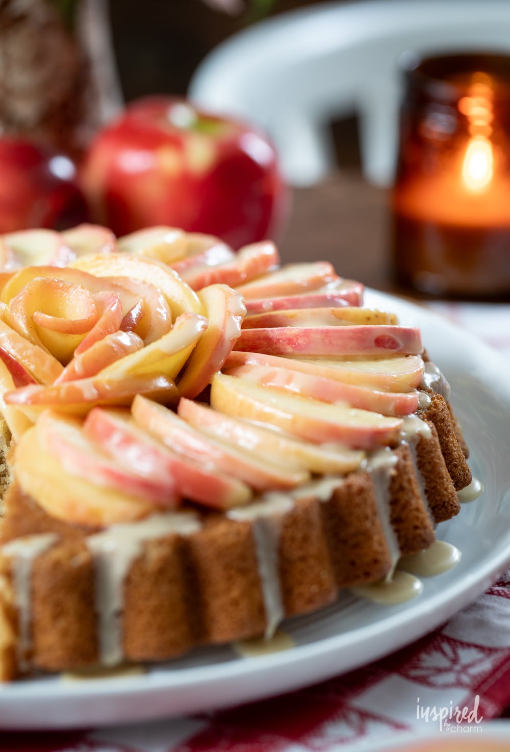 close of of fresh apple on top of apple cake.
