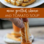 Mini Grilled Cheese and Tomato Soup on a plate with one being dipped into the soup.
