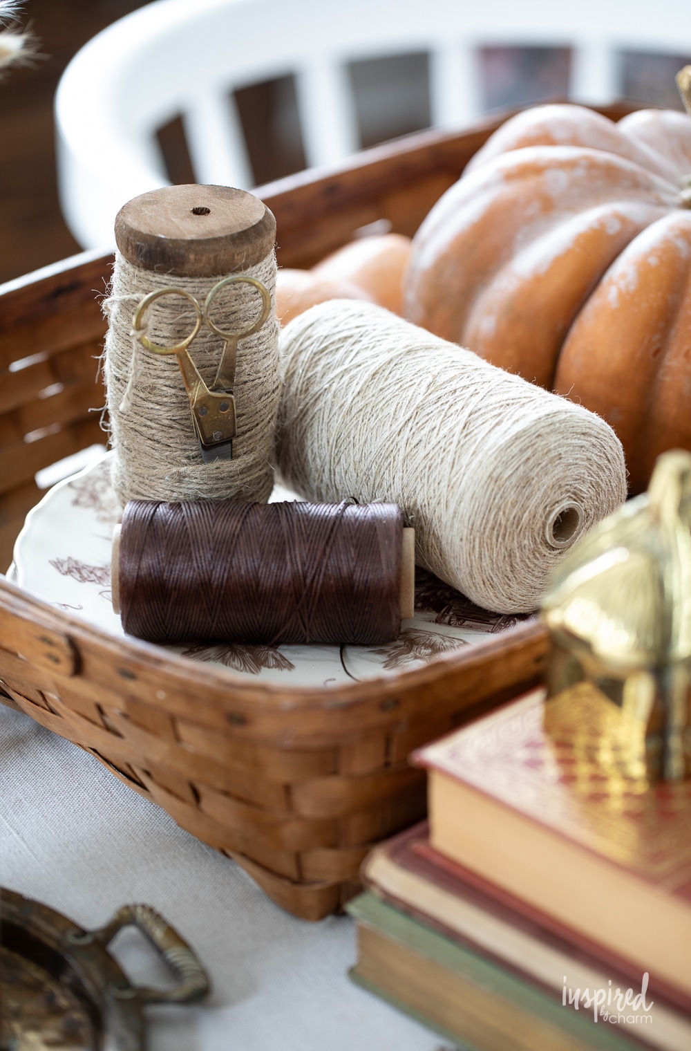 close up of vintage wooden spools with string and twine.