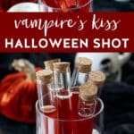 red halloween shot served in vials presented in a clear glass vase.