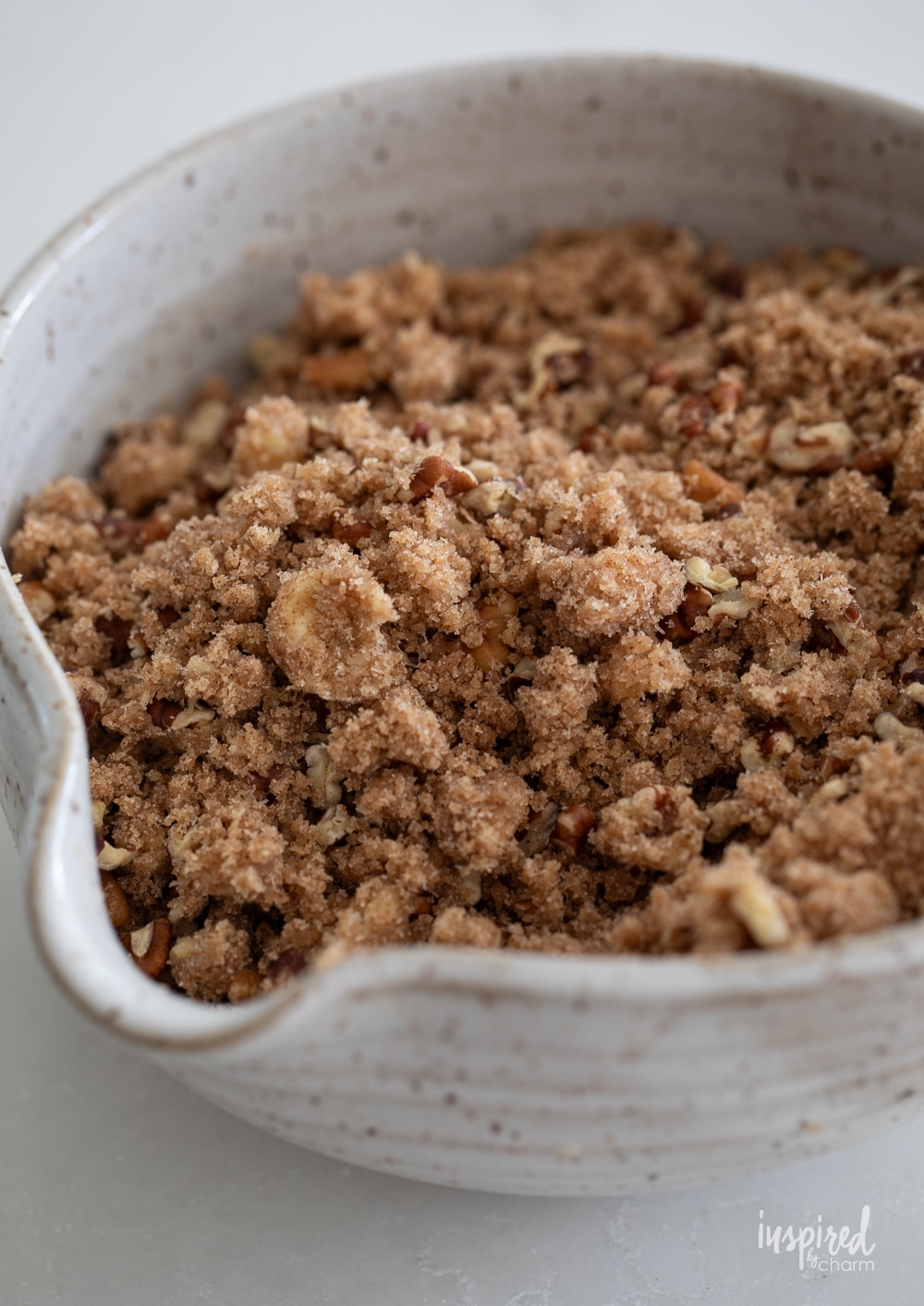 streusel mix in a bowl for pumpkin swirl coffee cake.