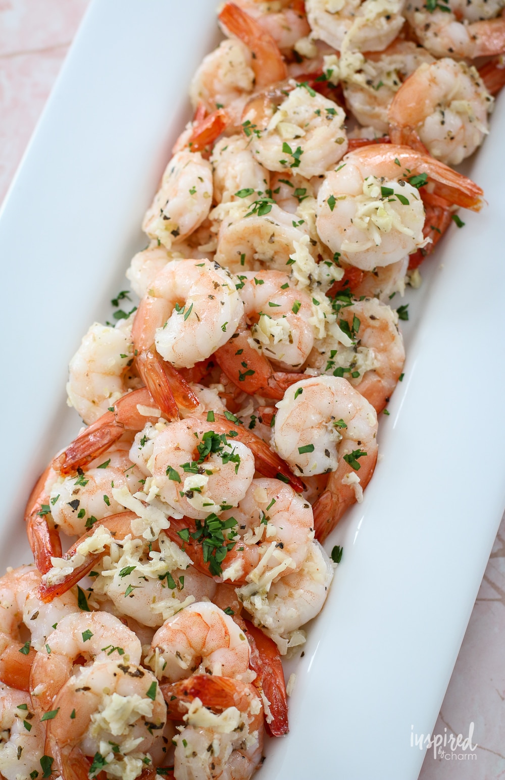 platter filled with parmesan garlic roasted shrimp. 