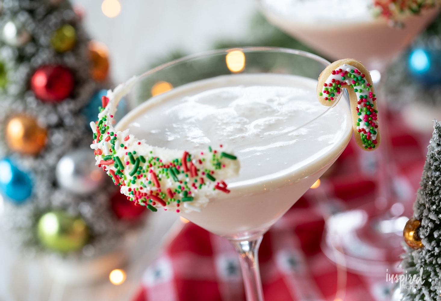 sugar cookie Martin in a glass with a candy cane cookie garnish.