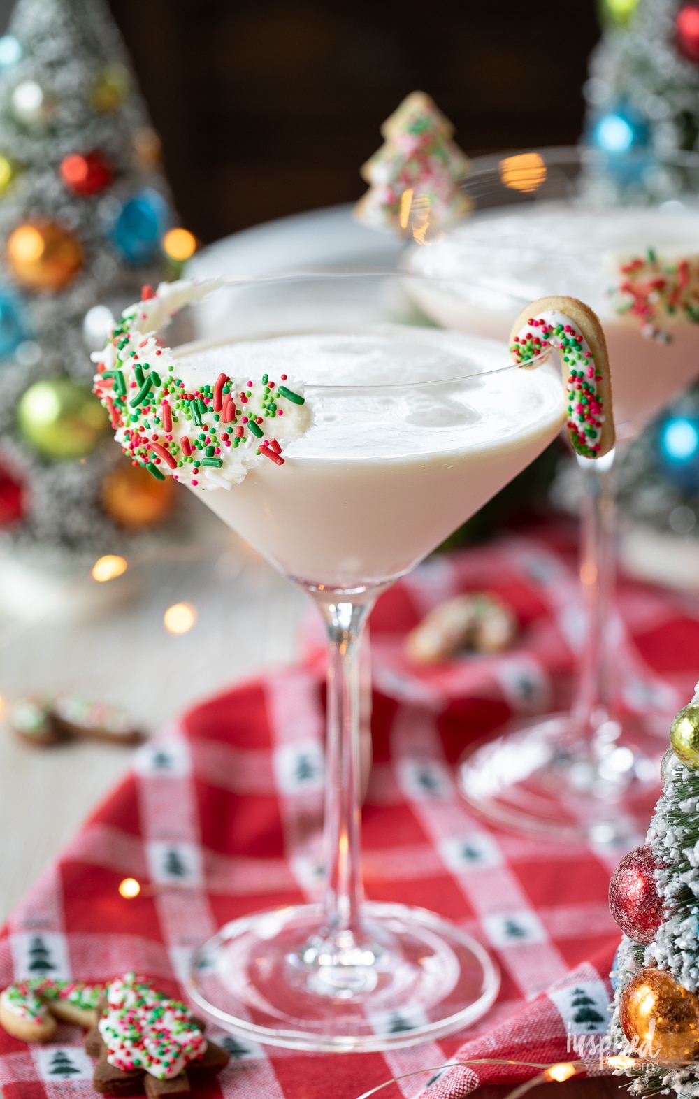sugar cookie martini in glasses with cookie garnish.