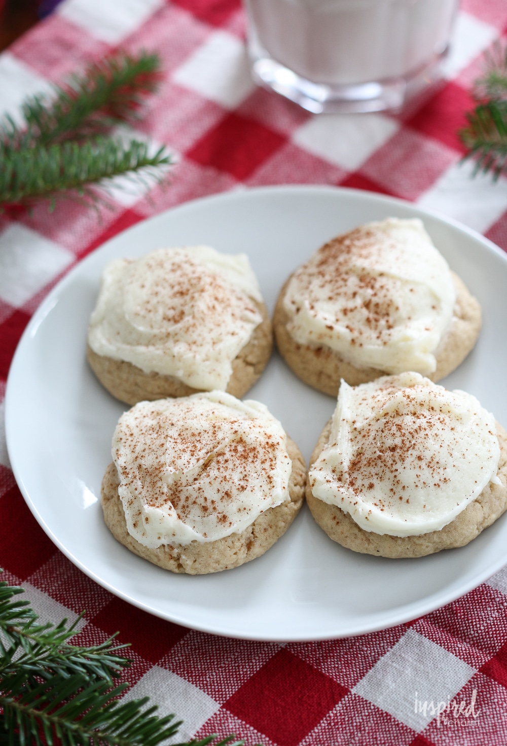 homemade frosted eggnog cookies on a plate.