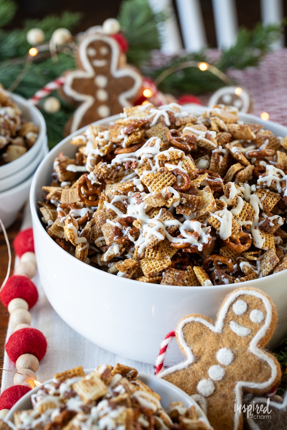 big white bowl of gingerbread chex mix.