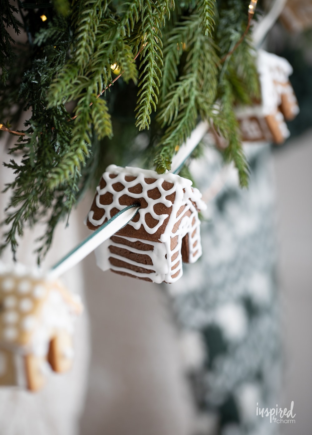 mini gingerbread houses strung on a ribbon to create a festive garland.