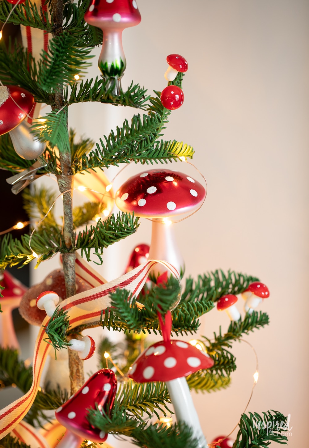 christmas tree filled with glass mushroom ornaments.
