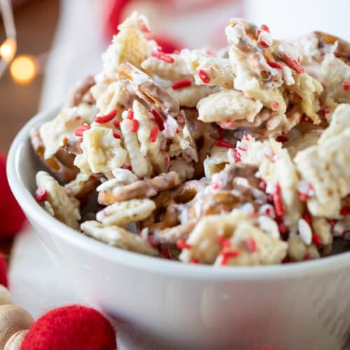 large bowl of peppermint white chocolate chex mix .