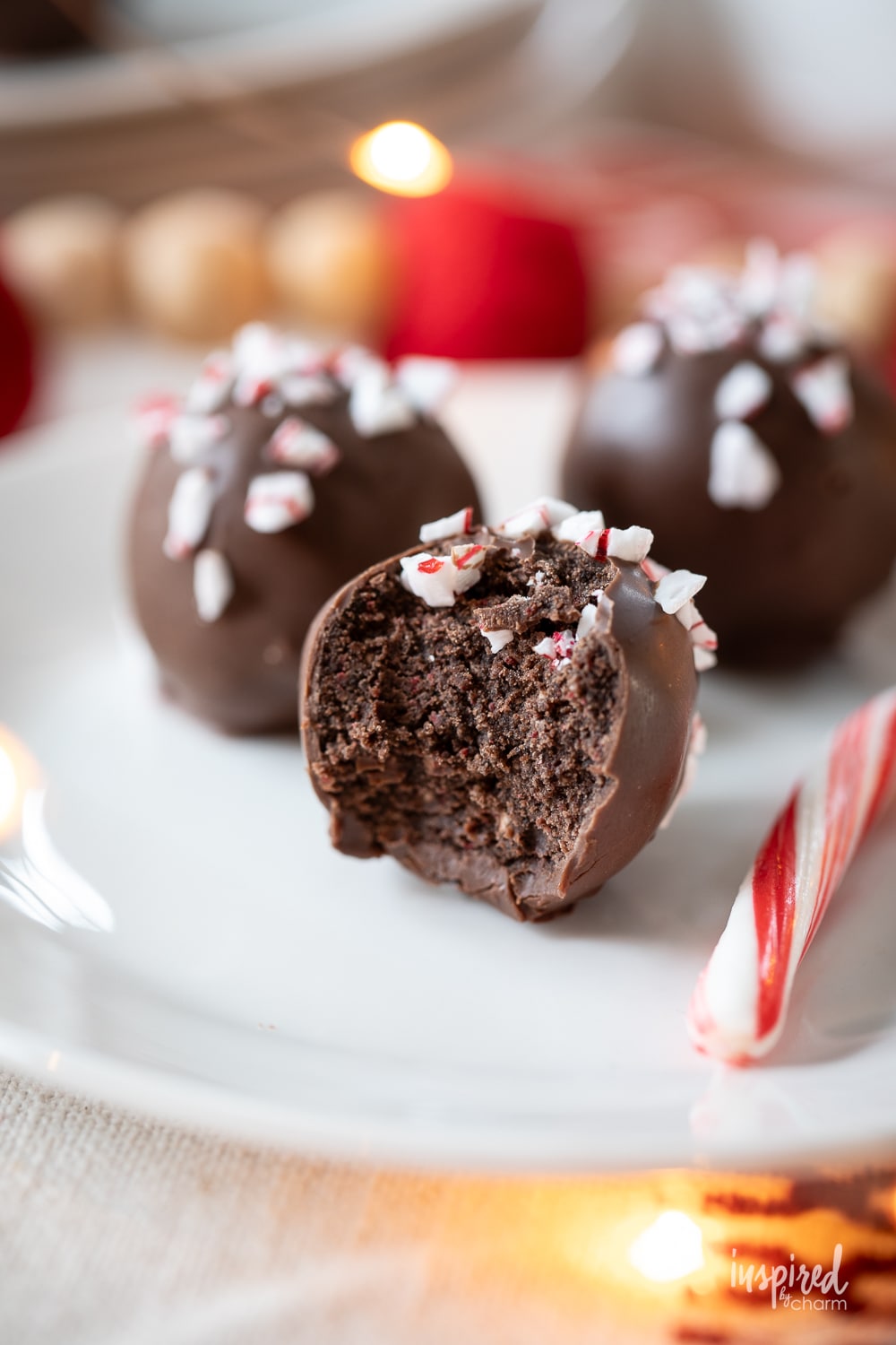 peppermint Oreo truffle with one that has a bite taken out.