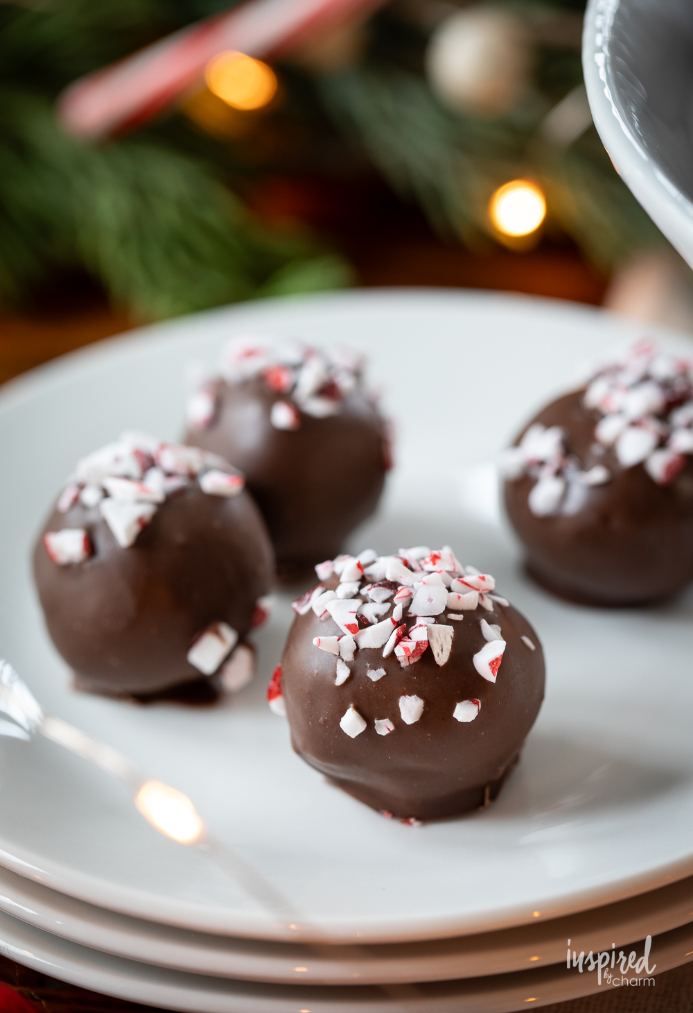 small peppermint Oreo truffles on a plate. 