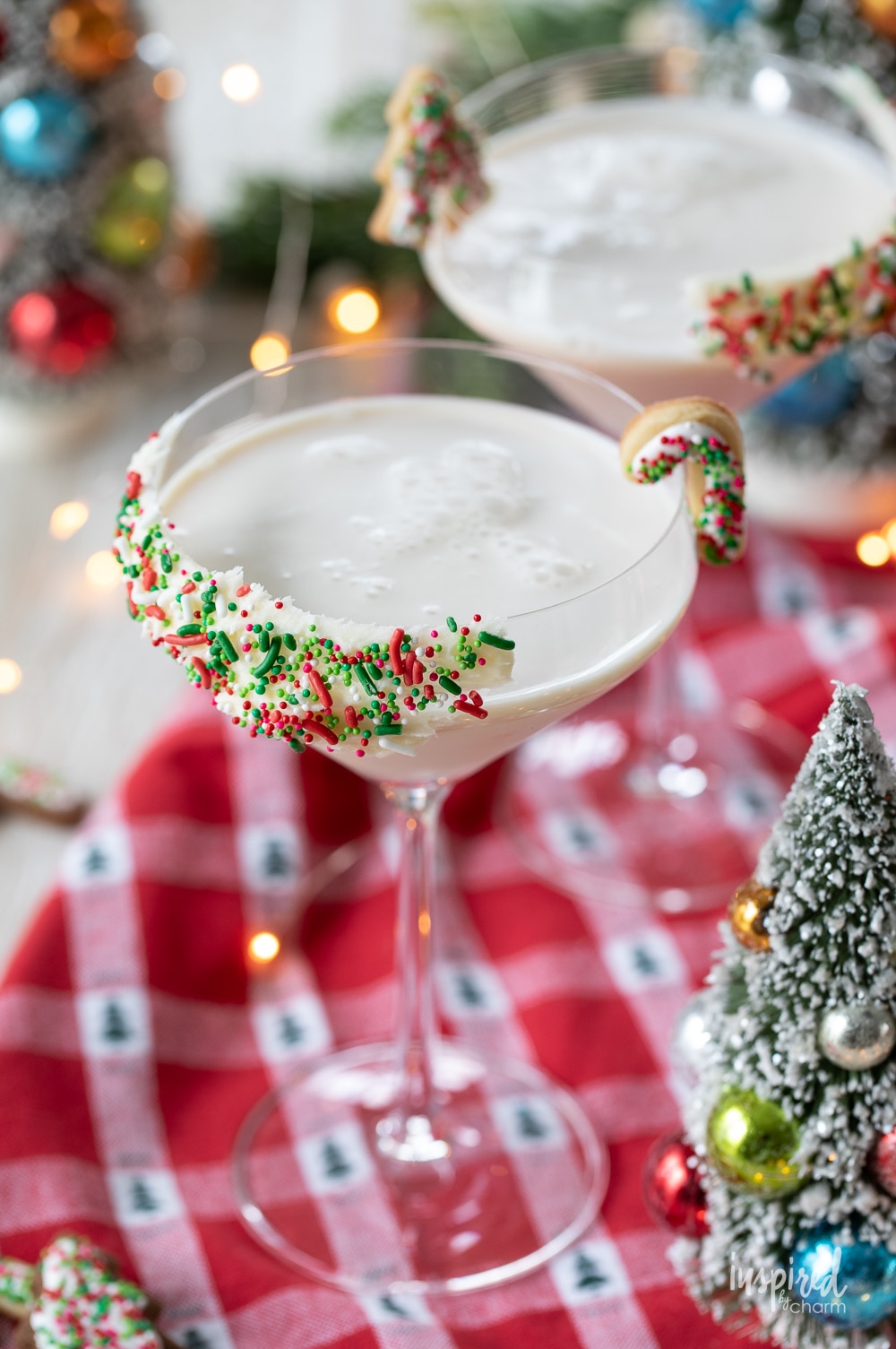 festive christmas sugar cookie martini with sprinkle garnish.
