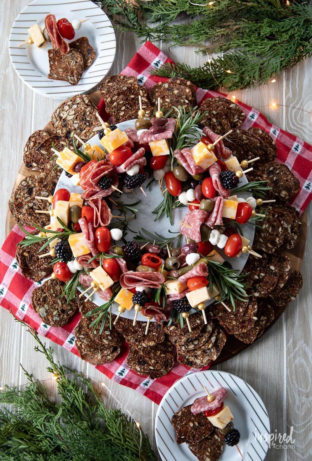 festive appetizer wreath made with mini antipasto skewers.