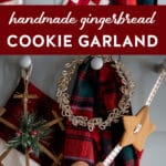 gingerbread cookie garland hung on entryway coat rack with stockings.