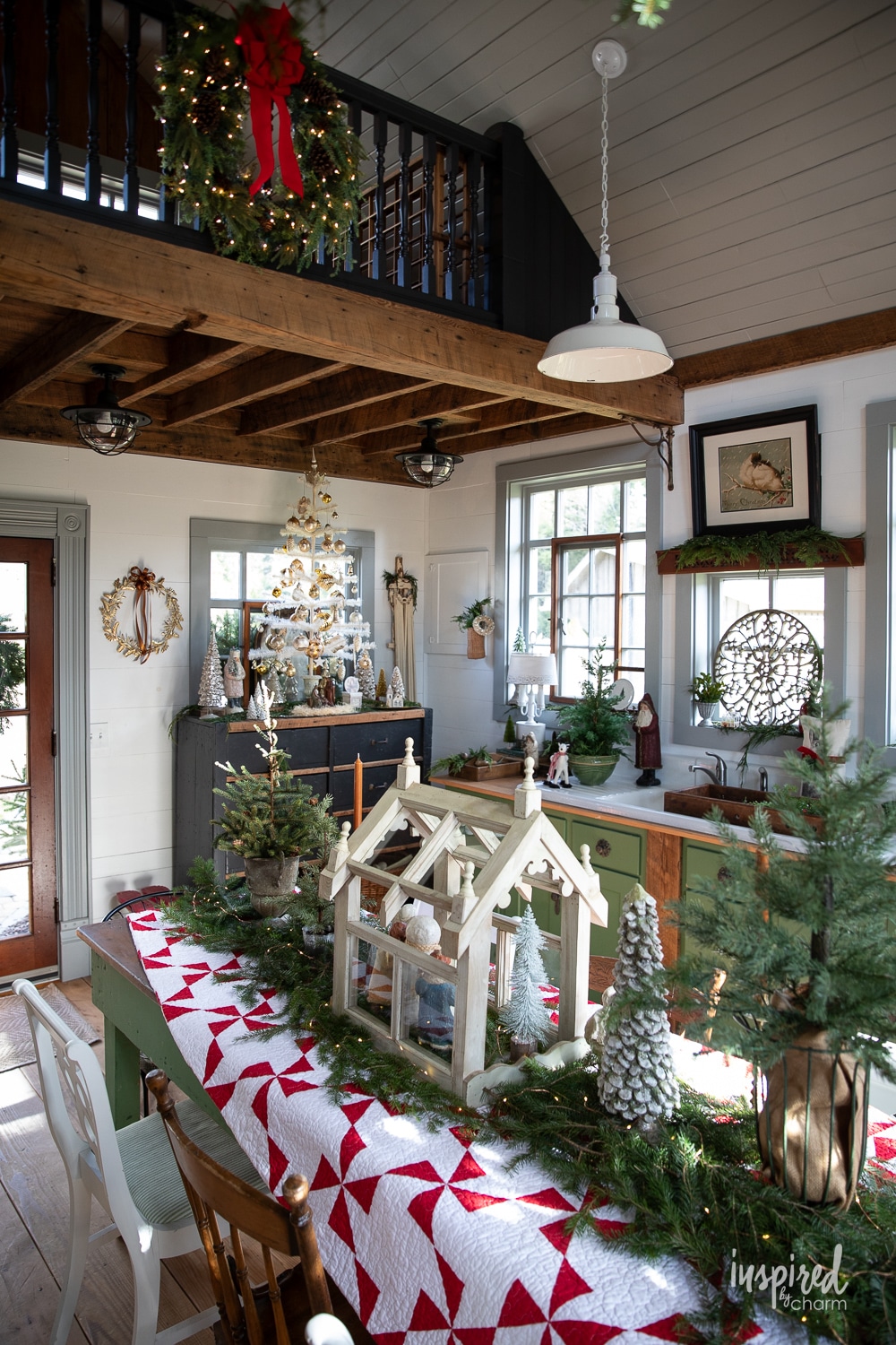 house with loft decorated for Christmas.