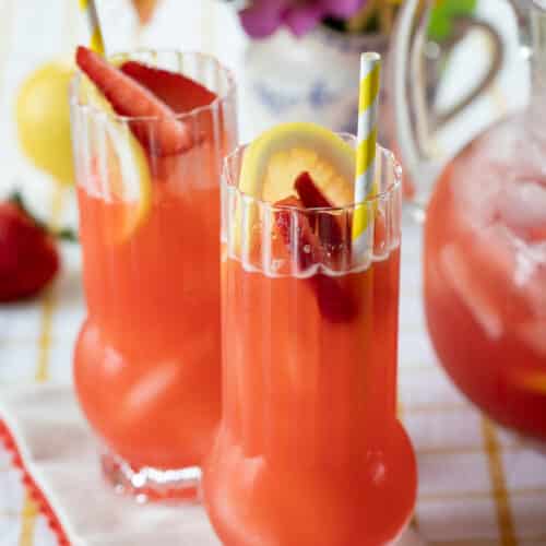 Strawberry Lemonade Vodka Cocktail in glasses on a napkin.