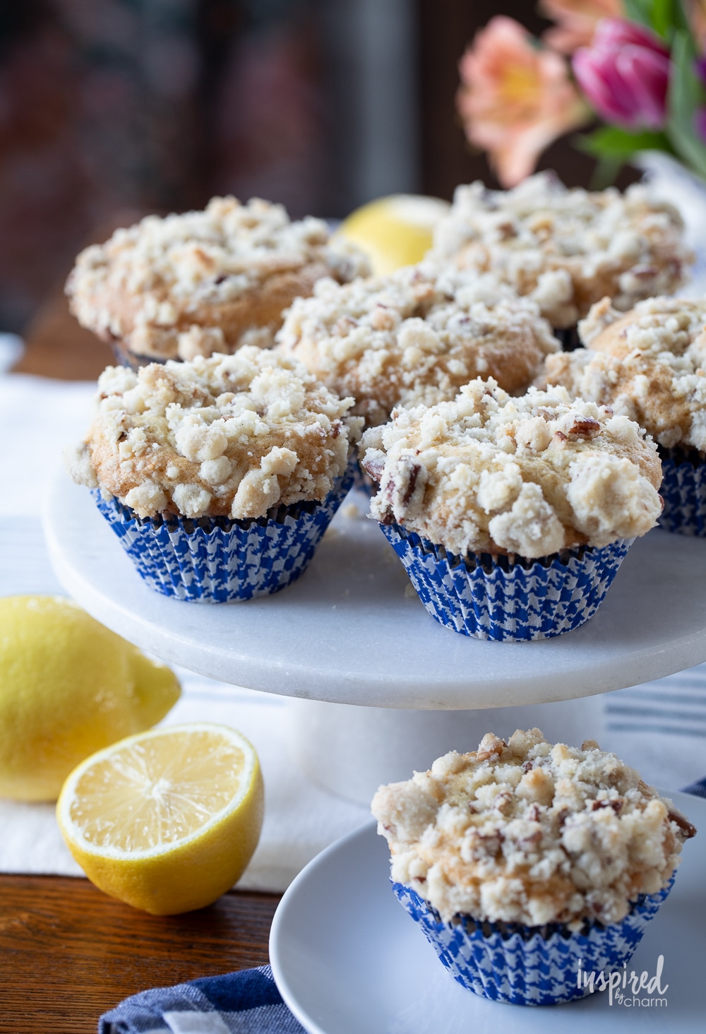 white cake plate filled with lemon curd muffins. 