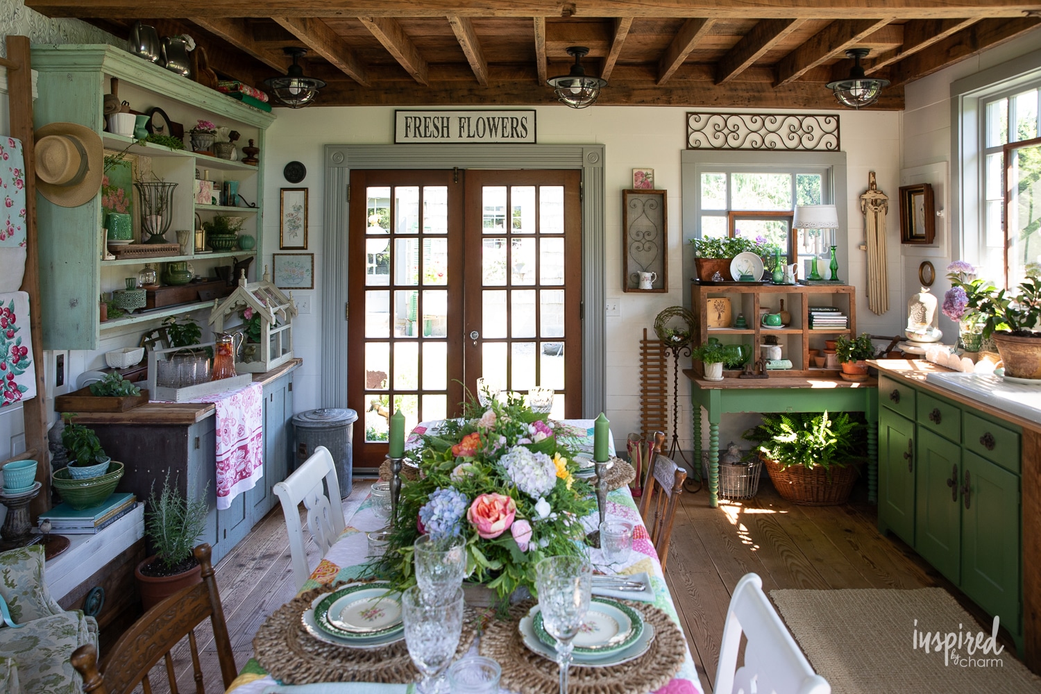 garden shed decorated with vintage finds for the summer. 