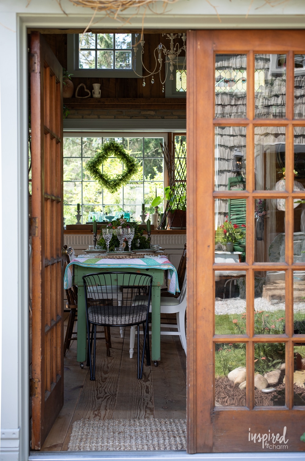 door open to garden shed with table inside. 