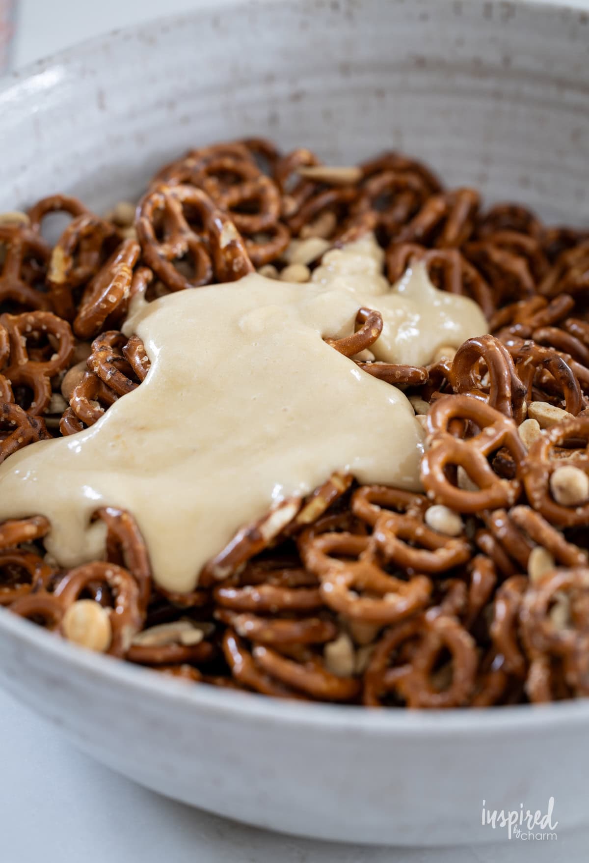 caramel toffee poured on pretzels and cashews.