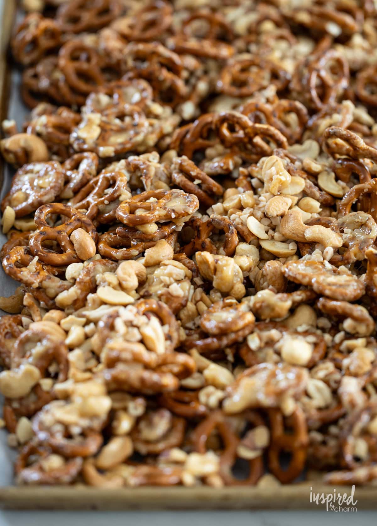 Sweet & Salty Cashew Toffee Pretzels on a baking sheet.