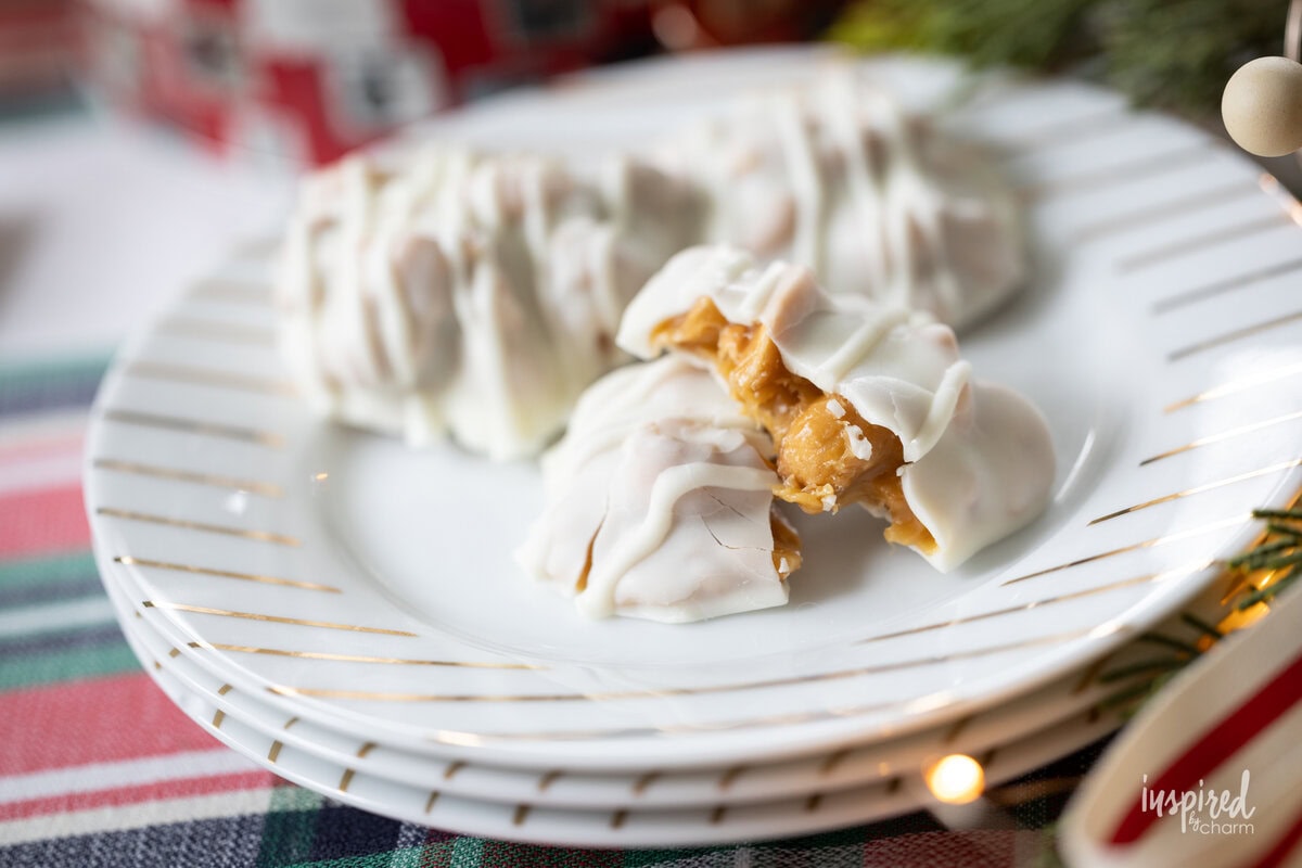 Homemade Caramel Cashew Clusters polar bear paws on a plate.