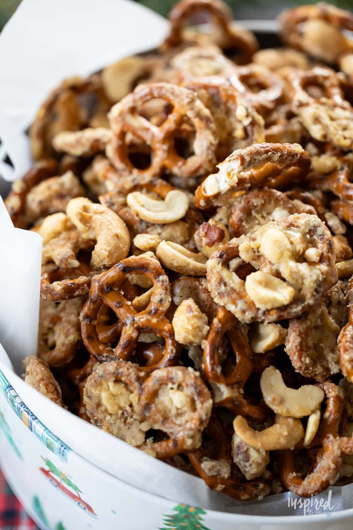 tin filled with Sweet & Salty Cashew Toffee Pretzels.