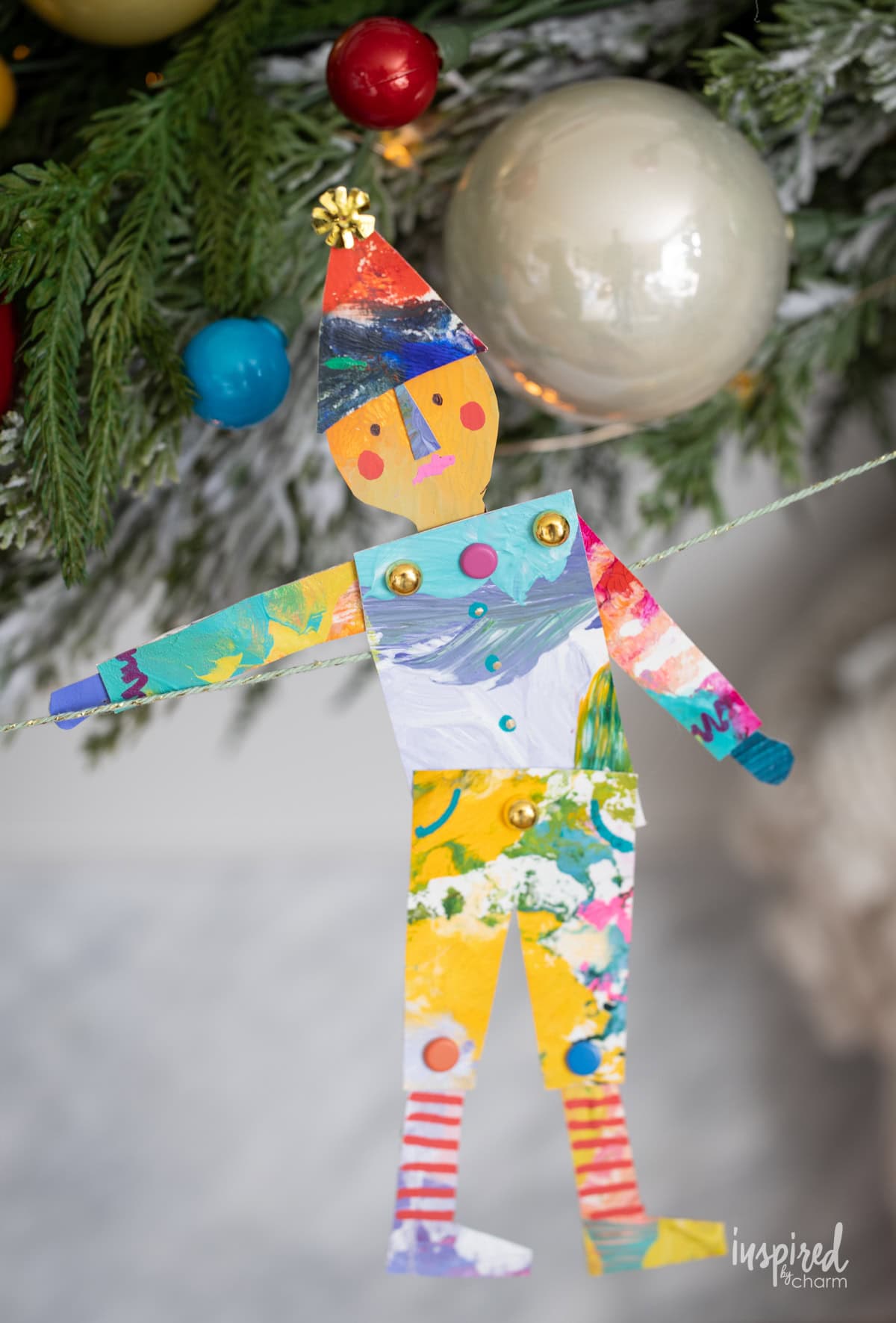 adorable figure made from painted paper plates.